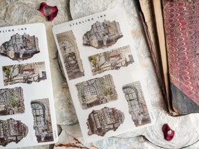 Sheet of vintage, sepia-toned torn paper stickers featuring detailed die-cuts of distressed architecture, old doorways, and classic storefront illustrations.