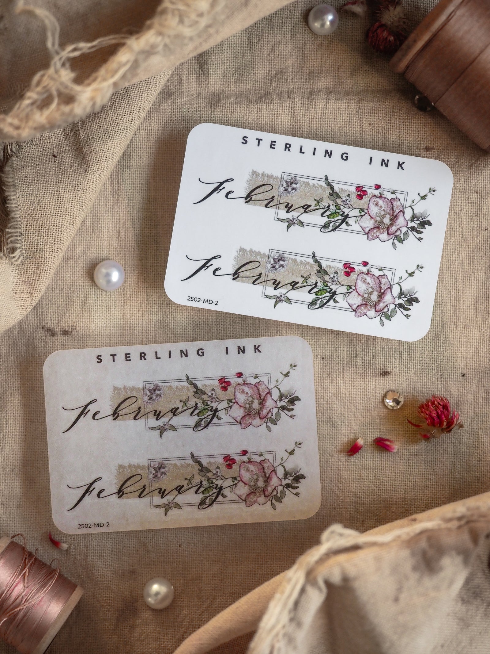 Elegant "February" month sticker set featuring soft pink roses, botanical greenery, and delicate floral borders for journaling or planning.