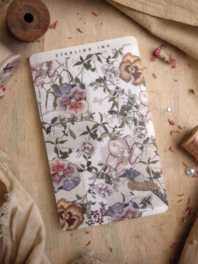 Vintage floral deco sheet featuring a romantic pattern of muted blush peonies, leafy greens, and delicate wildflowers.