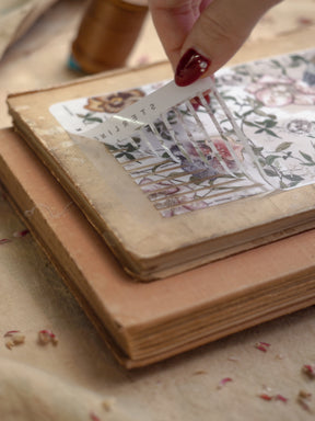 Pale strip stickers featuring an intricate, vintage botanical design with delicate cream and muted green floral elements.