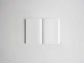 Open sketchbook featuring double-page graph paper, displaying precise grid lines ideal for technical drawing, journaling, or academic planning.