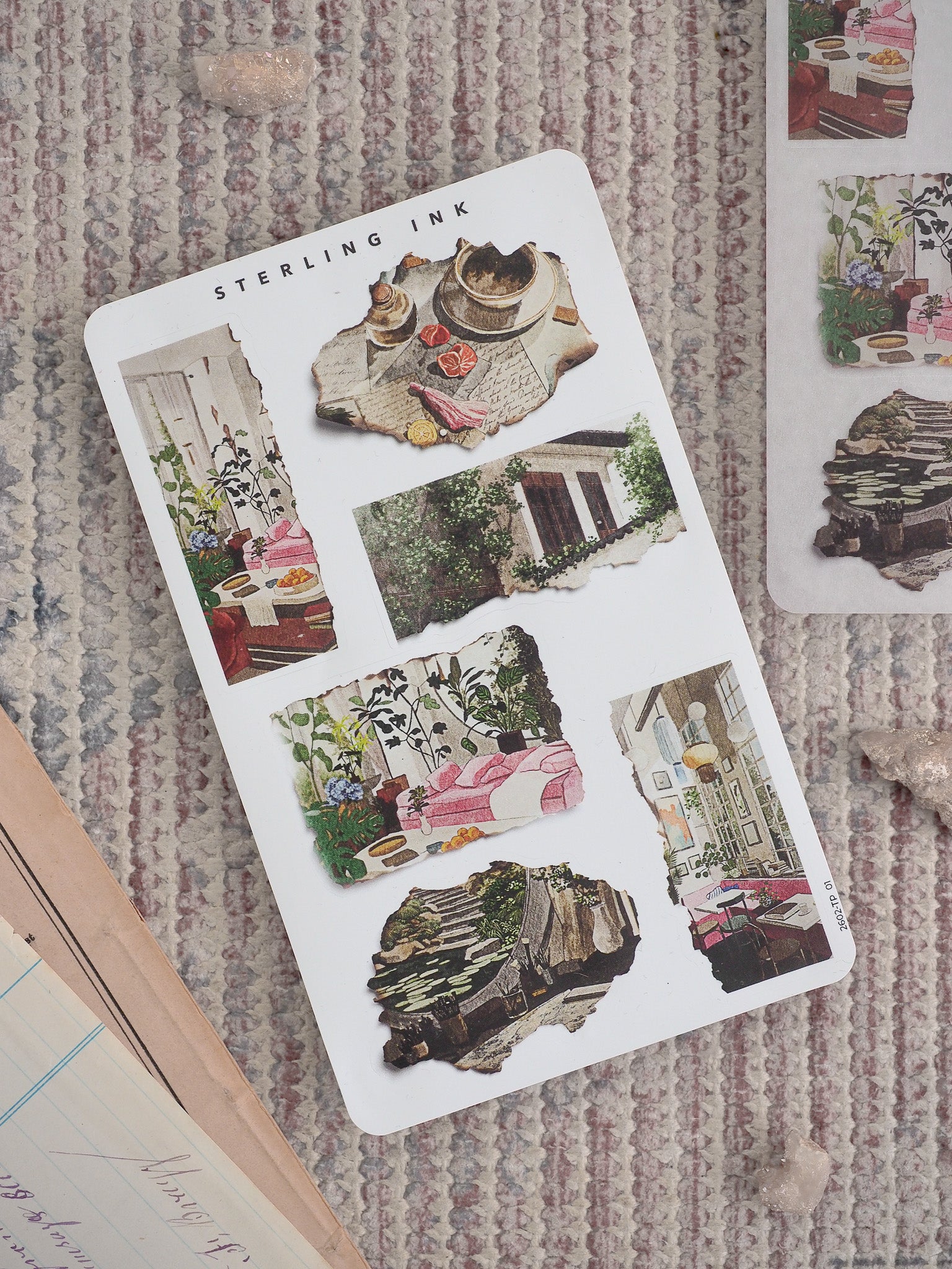 A festive sheet of distressed, torn paper stickers featuring vintage vignettes of domestic life, food, architecture, and rustic seasonal scenes for scrapbooking.