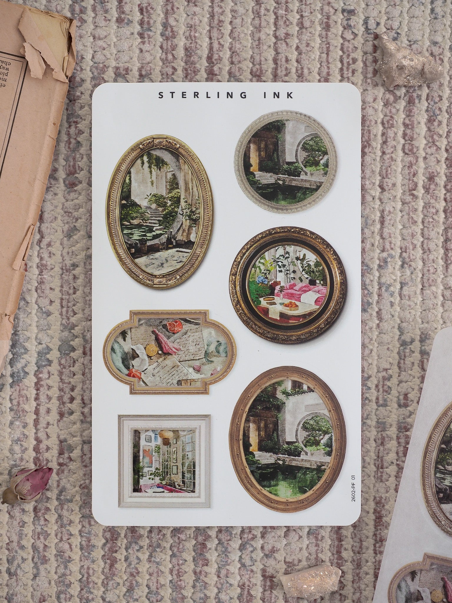 Decorative sticker sheet featuring various ornate frames and vintage watercolor illustrations of European architecture and elegant still life subjects.