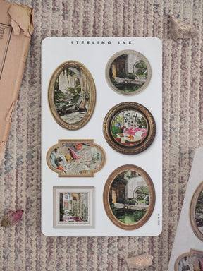 Decorative sticker sheet featuring various ornate frames and vintage watercolor illustrations of European architecture and elegant still life subjects.