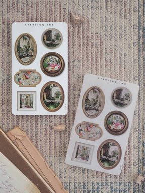 Sheet of assorted sticker embellishments featuring vintage picture frames with ornate borders and sepia-toned pictures of scenic and historical interiors.