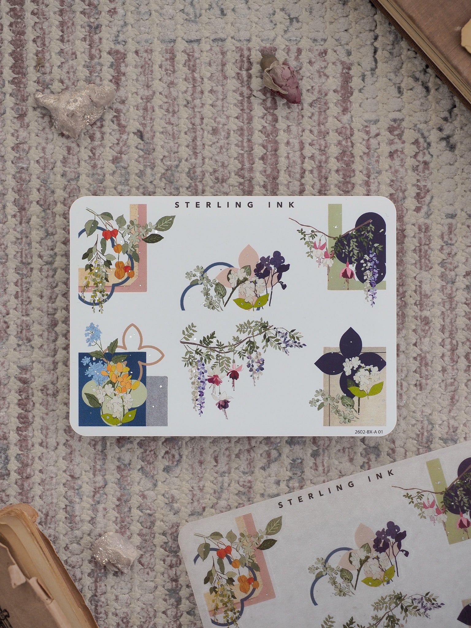 Decorative sticker set featuring watercolor floral and botanical motifs with rounded corners, incorporating deep purple, blue, and natural green foliage.