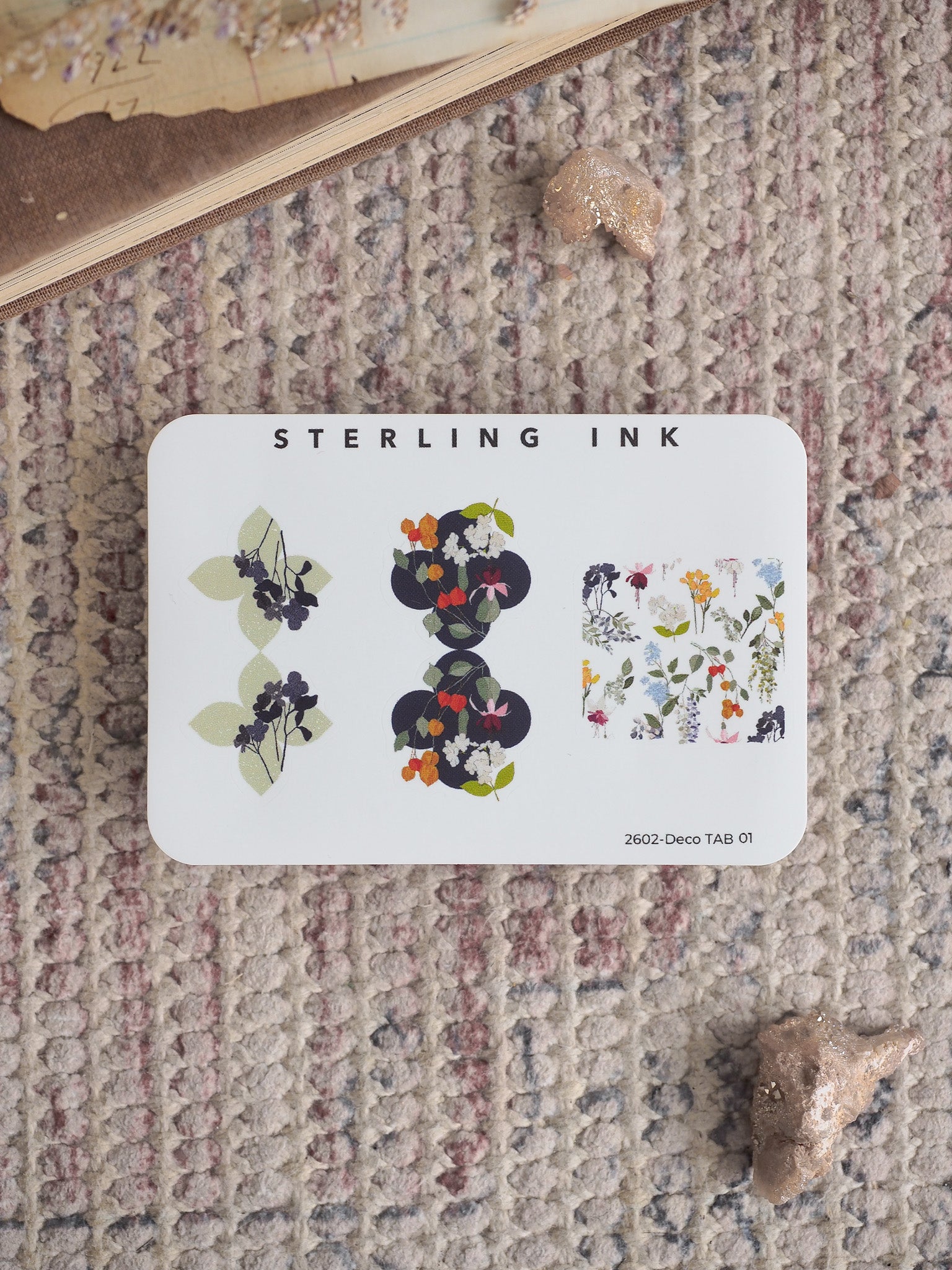 Decorative floral tabs featuring three distinct designs: delicate sketches, rich dark bouquets, and a vibrant watercolor botanical pattern for planning and crafting.