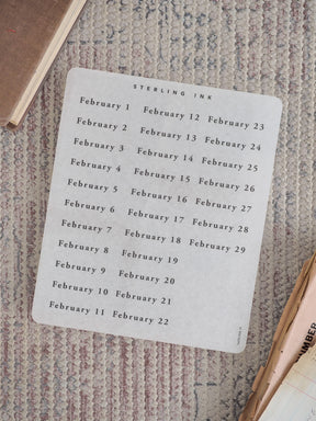 White calendar sticker sheet detailing every date for February 2026, arranged in two clean columns using crisp black typography.