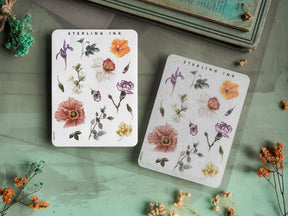 A delicate sticker set featuring lush watercolor illustrations of various botanical elements, including peonies, cosmos, and assorted greenery.
