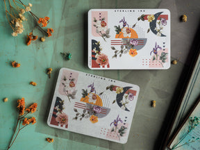 Botanical corner stickers featuring deep jewel tones, watercolor florals, and abstract crescent moons, perfect for March scrapbooking and planner embellishments.