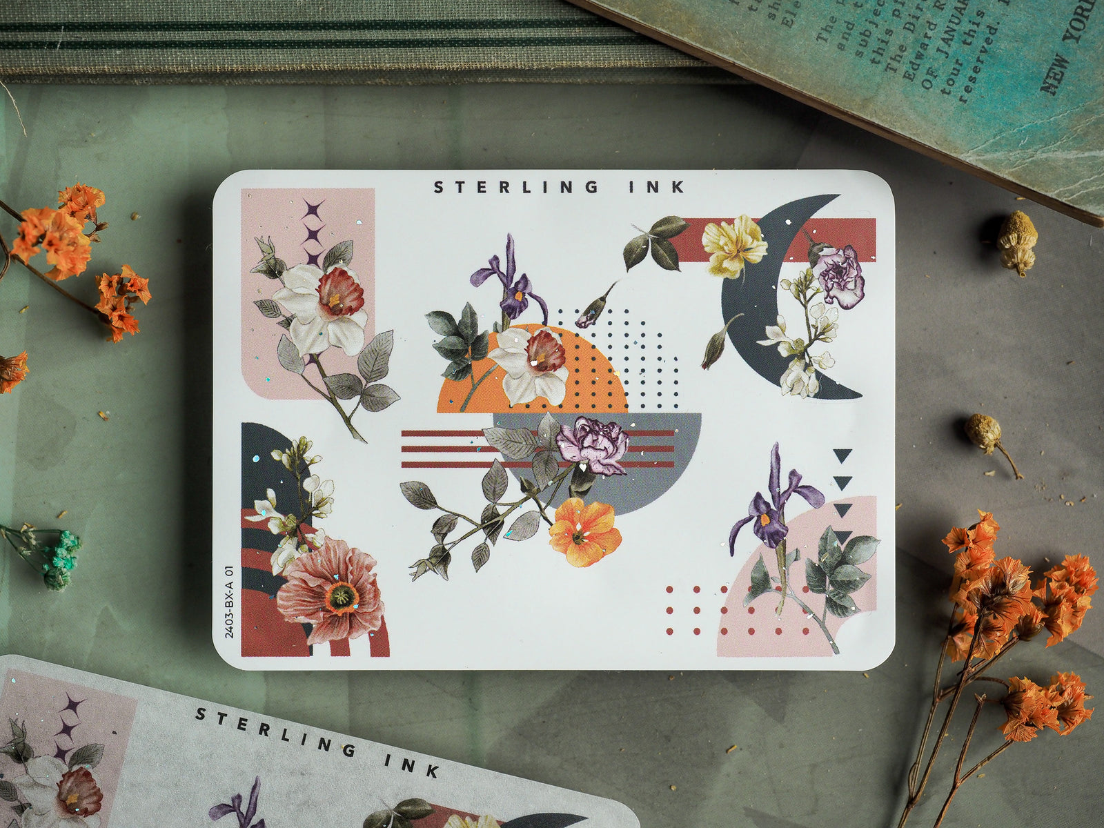 Whimsical floral sticker sheet displaying bohemian designs, including pink and purple blooms, striped banners, and crescent moons.