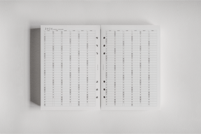 Structured monthly planner insert for 2026, featuring crisp white pages and dated grids for year-long organization.
