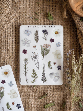 Botanical elements stickers featuring delicate floral and leaf illustrations in various shades, perfect for crafting and journal decorating.