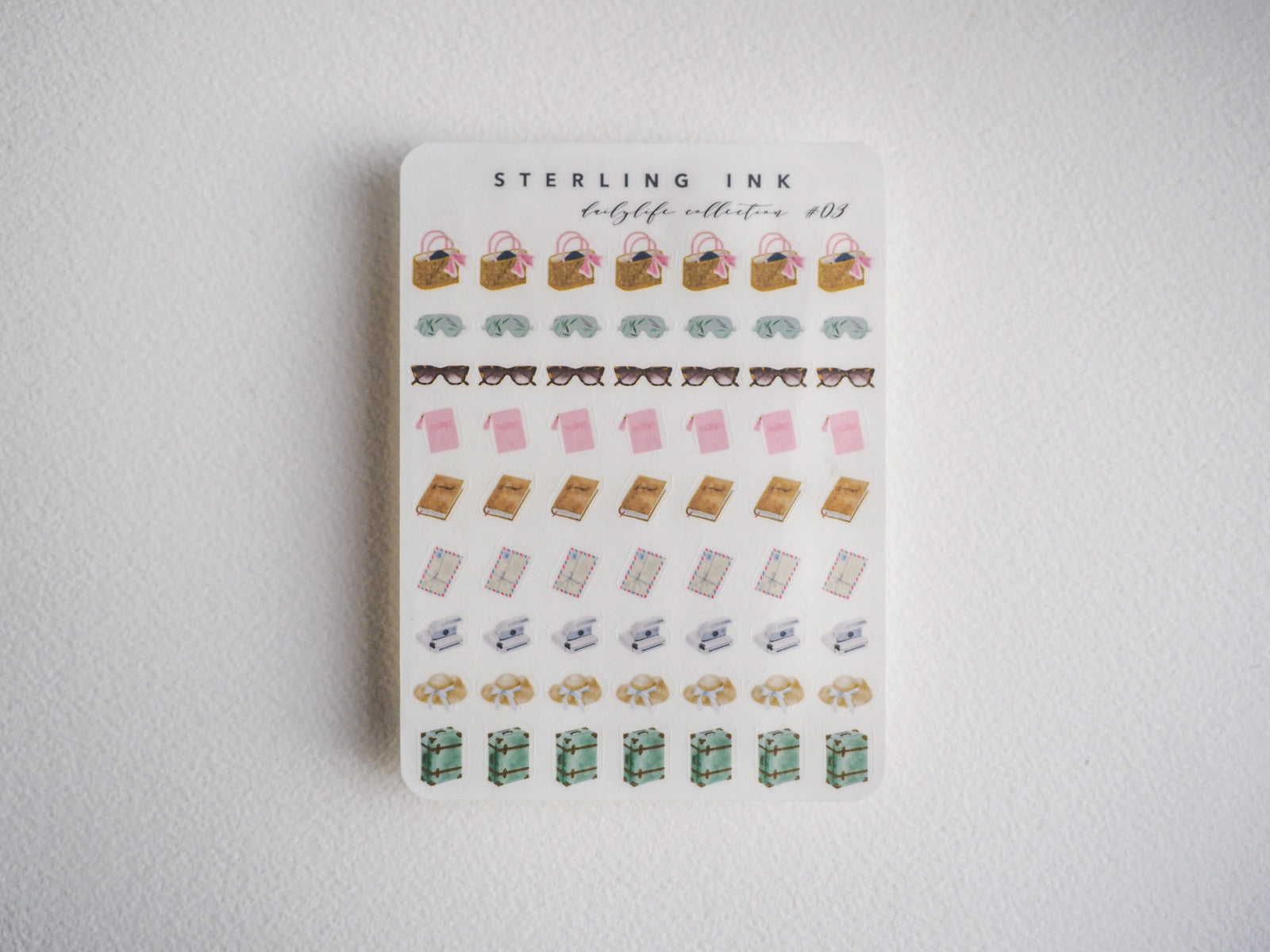 Decorative sticker set featuring mini gift bags, frames, sunglasses, small boxes, and plants. Perfect stationery supplies
