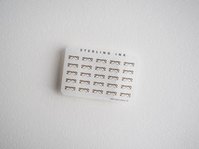 Sheet of minimalist line-art mini glasses stickers. Features repeating black line-art designs perfect for journaling,