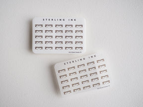 Set of mini glasses sticker sheets. Minimalist line-art design featuring dozens of detailed eyeglass and sunglass