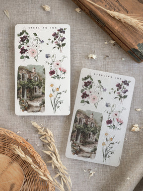 Vintage floral sticker sheet featuring delicate watercolor arrangements of spring blooms, roses, and a charming cottage facade.