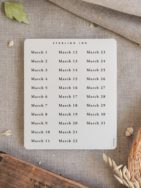 Crisp white sticker sheet featuring a clean calendar grid with all the dates for March 2026, designed for journaling and planning.