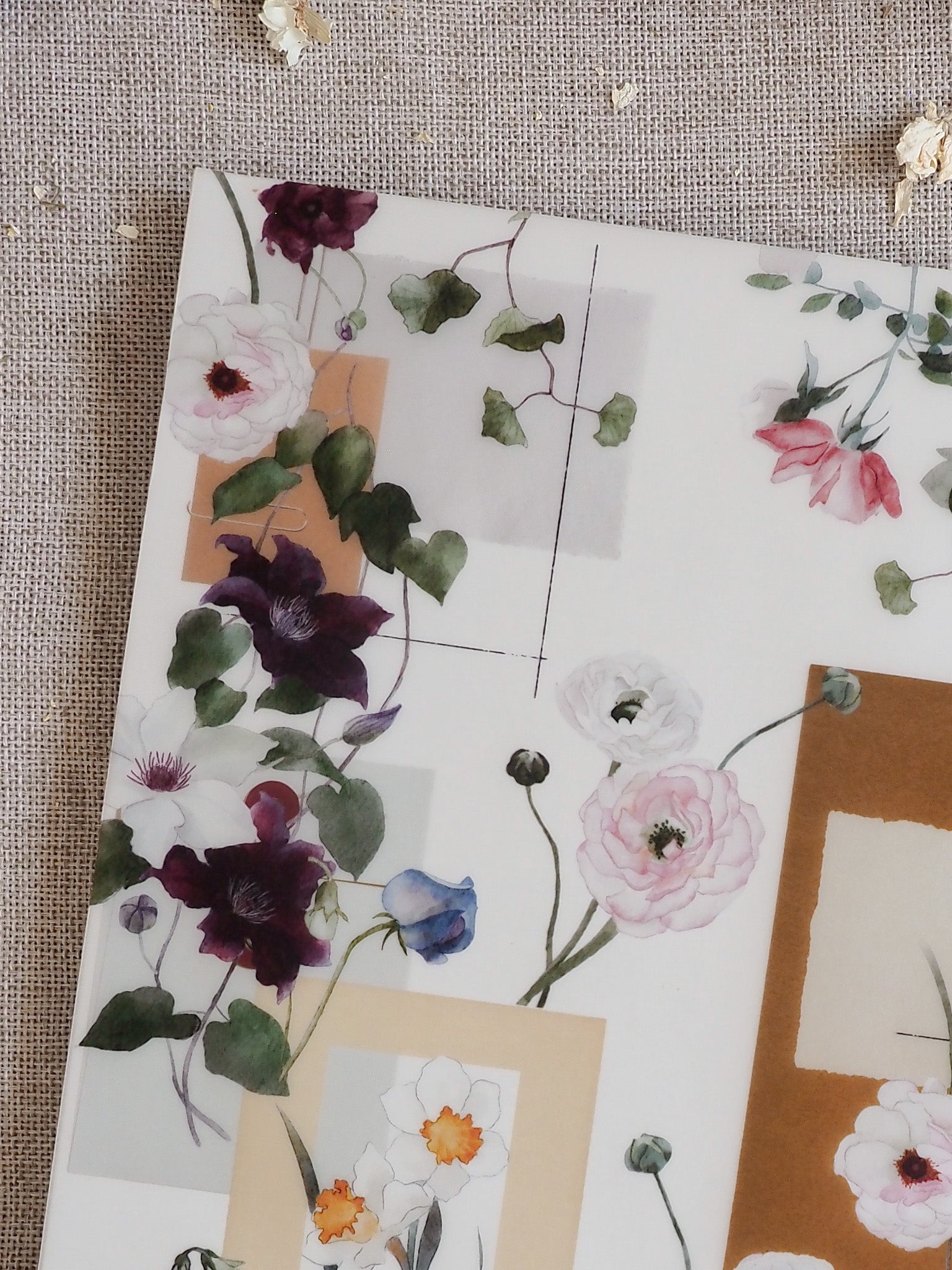 Watercolor floral planner cover featuring abundant spring blooms and greenery in shades of blush pink, deep plum, and cream.