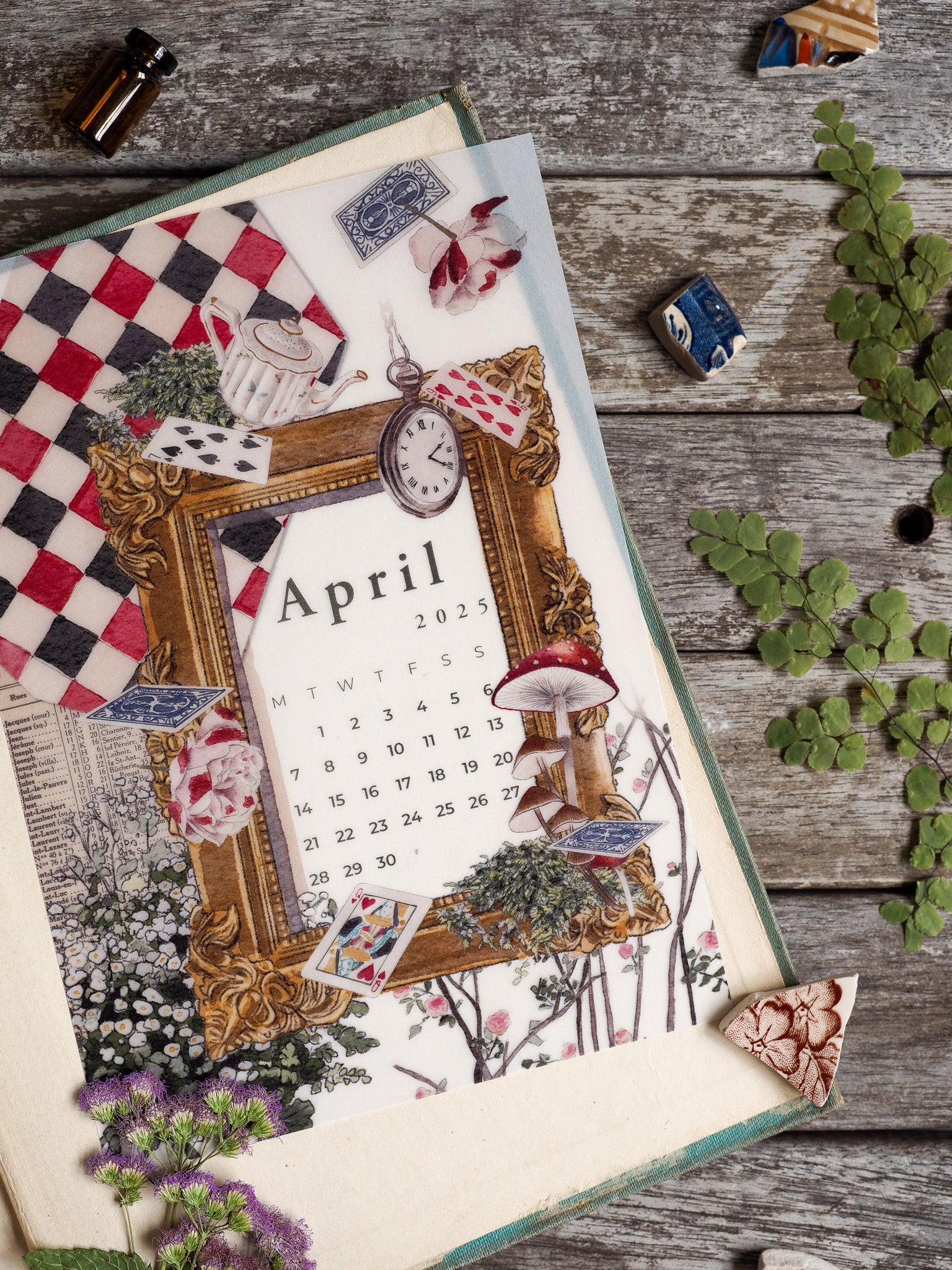 Ornate B6 monthly calendar for April 2025, featuring a detailed rustic woodland theme with a gold-leaf frame, mushrooms, and vintage floral accouterments.