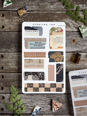Sterling Ink Torn Tape stickers featuring a variety of decorative designs, including checkered patterns, stripes, and delicate anatomical bone motifs, ideal for journaling and crafting.