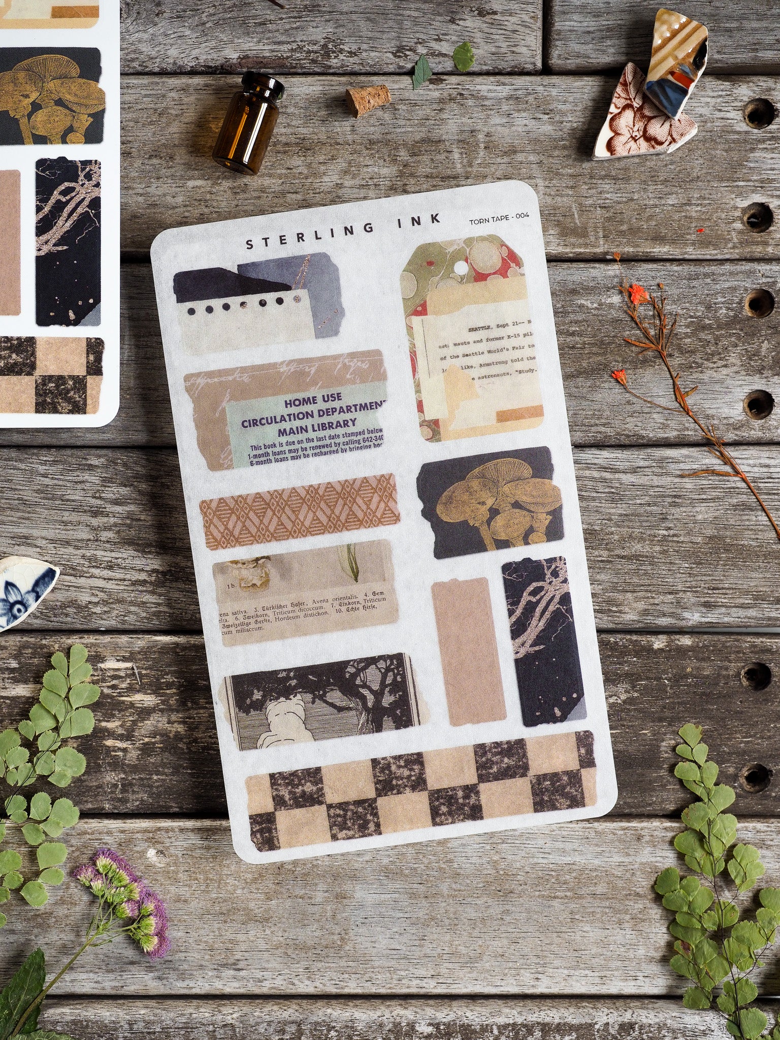 Archival torn tape stickers featuring botanical elements, vintage library labels, and rustic, neutral-toned designs perfect for scrapbooking and journaling.