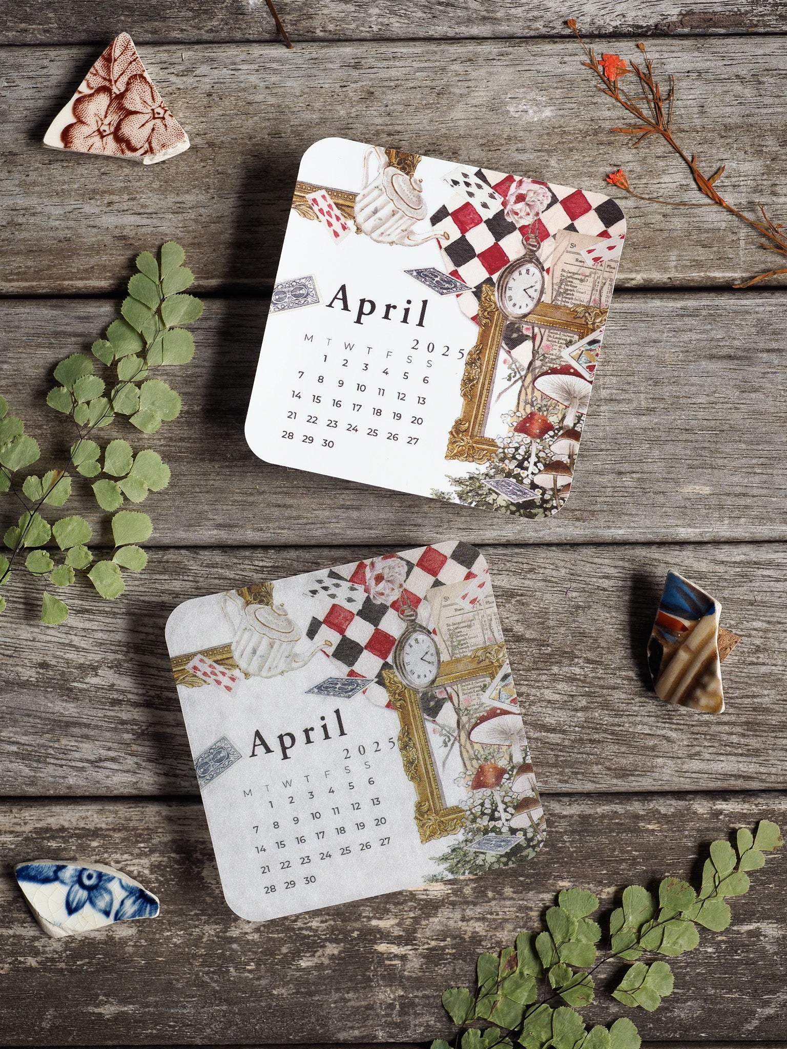 Charming April 2025 monthly calendar featuring a vintage, rustic aesthetic adorned with floral motifs, teacup illustrations, and classic checkered patterns.