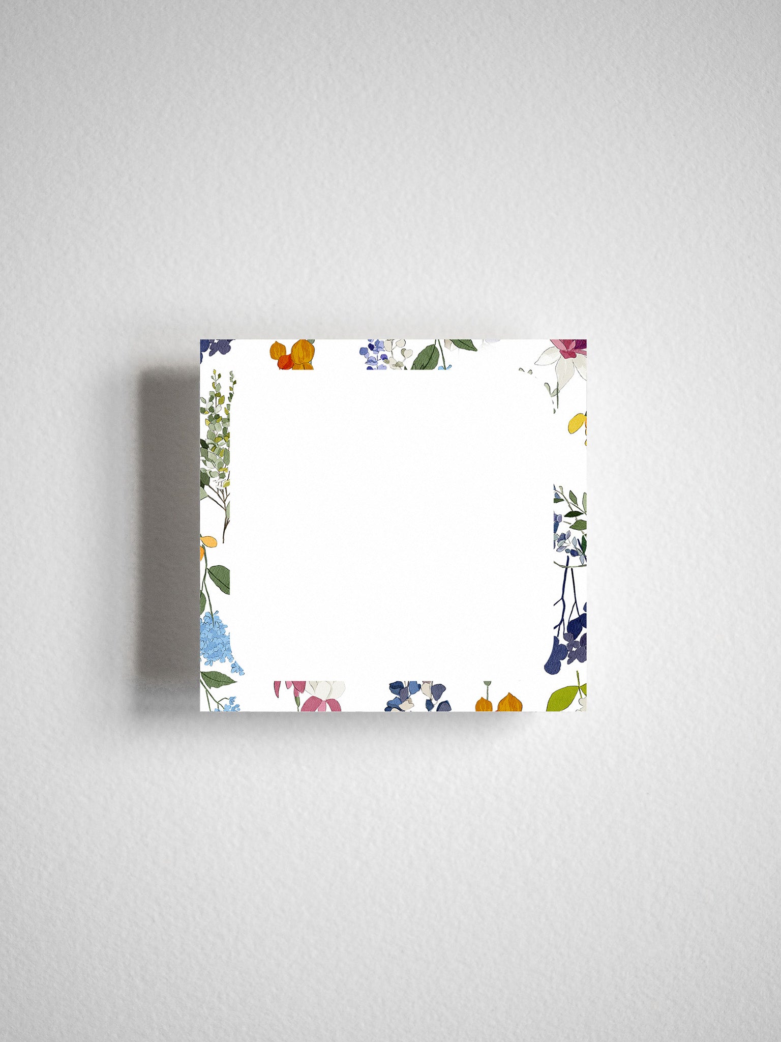 Watercolor-themed sticky note featuring a lush, vibrant paper garden border with soft spring flowers, leaves, and blooms.