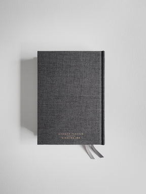 Textured, dark gray academic planner featuring elegant foiled lettering that reads "COMMON PLANNER" and "STERLING INK."