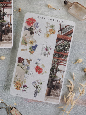 Delicate floral washi sticker sheet featuring a romantic mix of spring roses and wildflowers, accented with silver foil strips for planning and crafting.