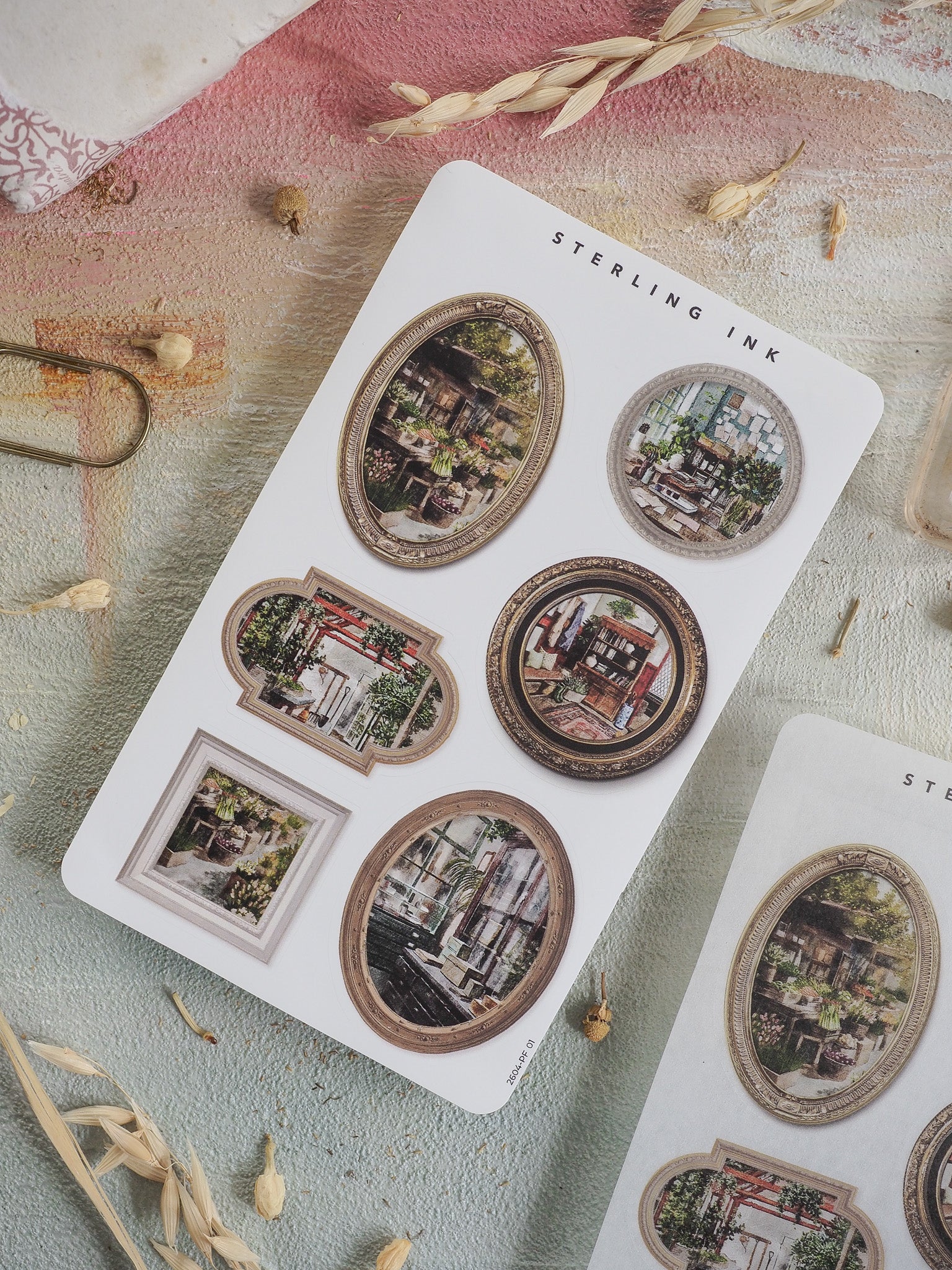 Collection of vintage picture frame stickers featuring varied aged borders and nostalgic black and white European street scenes, perfect for journaling and crafting.