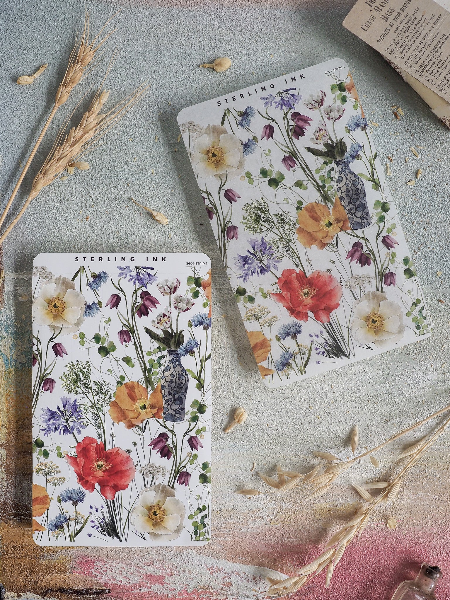 Botanical sticker set featuring rich, vibrant spring florals, including red poppies, yellow blossoms, and deep purple foliage on a crisp white background.
