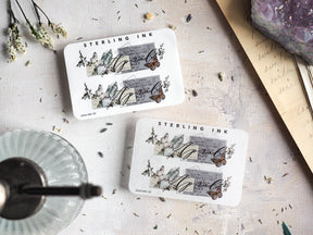 Delicate April 2024 month sticker set featuring whimsical botanical sketches, natural elements, and small illustrated woodland animals.