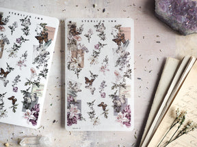 Delicate washi strip stickers featuring an intricate botanical and insect motif pattern, combining detailed illustrations of butterflies, flowers, and classical architecture.