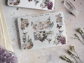Vintage sticker sheet featuring muted floral bouquets, geometric corner designs, and elegant edges in sepia tones with subtle silver foil accents.