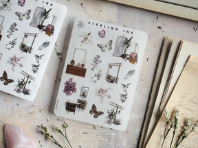 Vintage-themed sticker sheet featuring detailed, illustrated icons of spring florals, architectural elements, and butterflies in black ink.