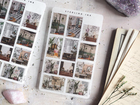 Vintage-themed sheet of "April 2024" stamps featuring a grid of cozy, sepia-toned illustrations of decorated indoor scenes, windows, and rustic home vignettes.