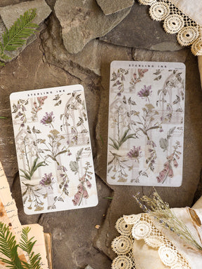 Elegant thin strips of stickers featuring vintage botanical illustrations in soft mauves, sage greens, and delicate dried floral designs.