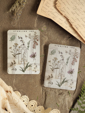 Elegant botanical element stickers featuring detailed, vintage illustrations of flowers and foliage in soft, muted tones for journaling.