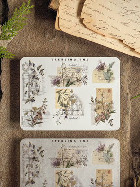 Vintage botanical corner stickers featuring detailed illustrations of flowers and foliage, perfect for journaling or scrapbooking, accented with silver foil edges.