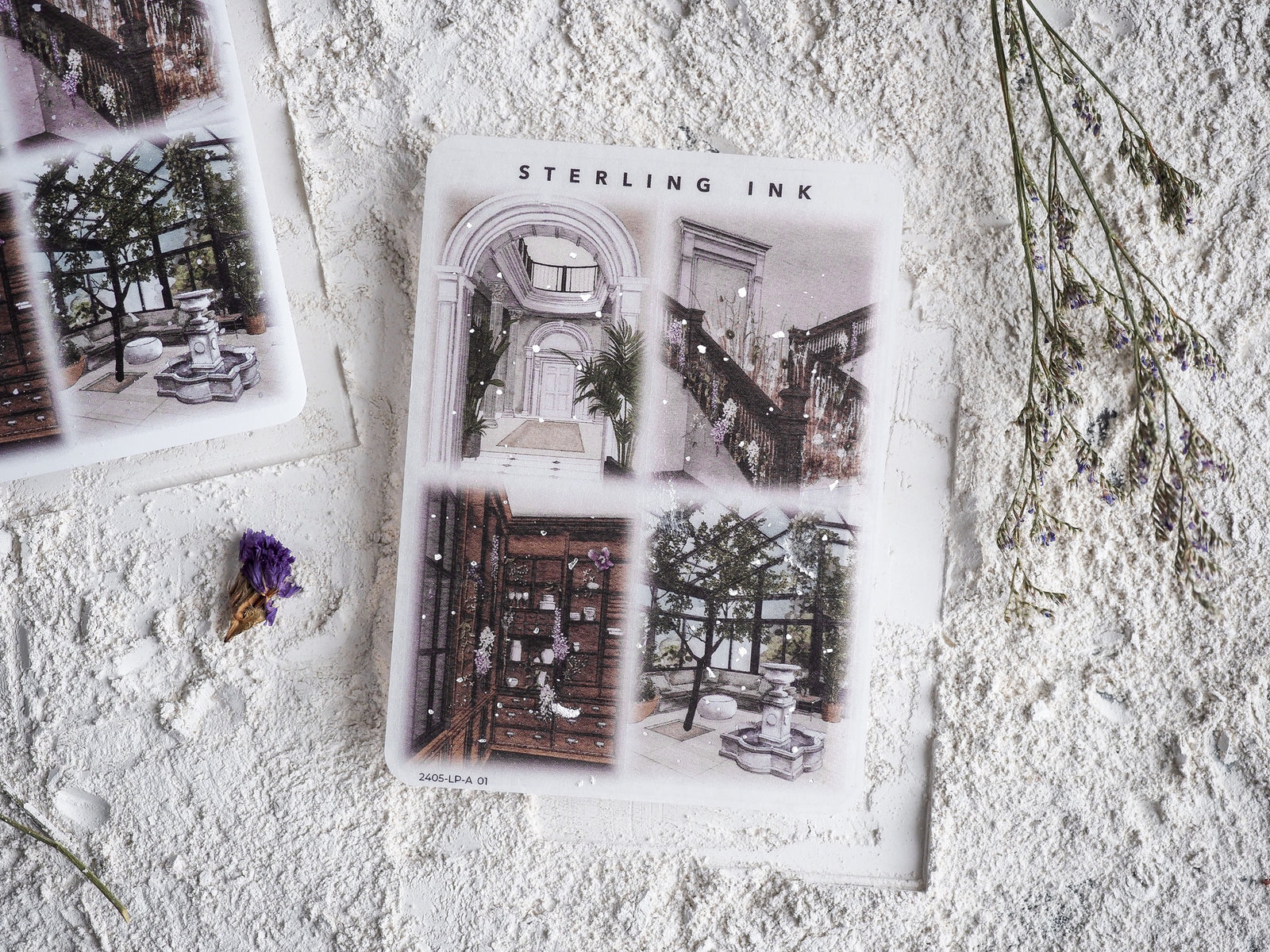 Illustrated sheets of large stickers featuring detailed vintage architectural scenes, ornate staircases, and charming fountain motifs with silver foil accents.