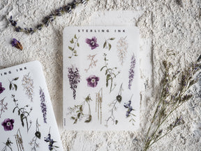 Botanical sticker sheet featuring detailed illustrations of purple lavender, small white wildflowers, and various shades of green foliage elements.