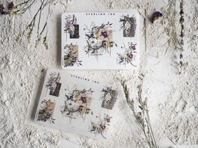Vintage and elegant decorative sticker sheets featuring scattered botanical illustrations, delicate florals, and silver foil corner embellishments.
