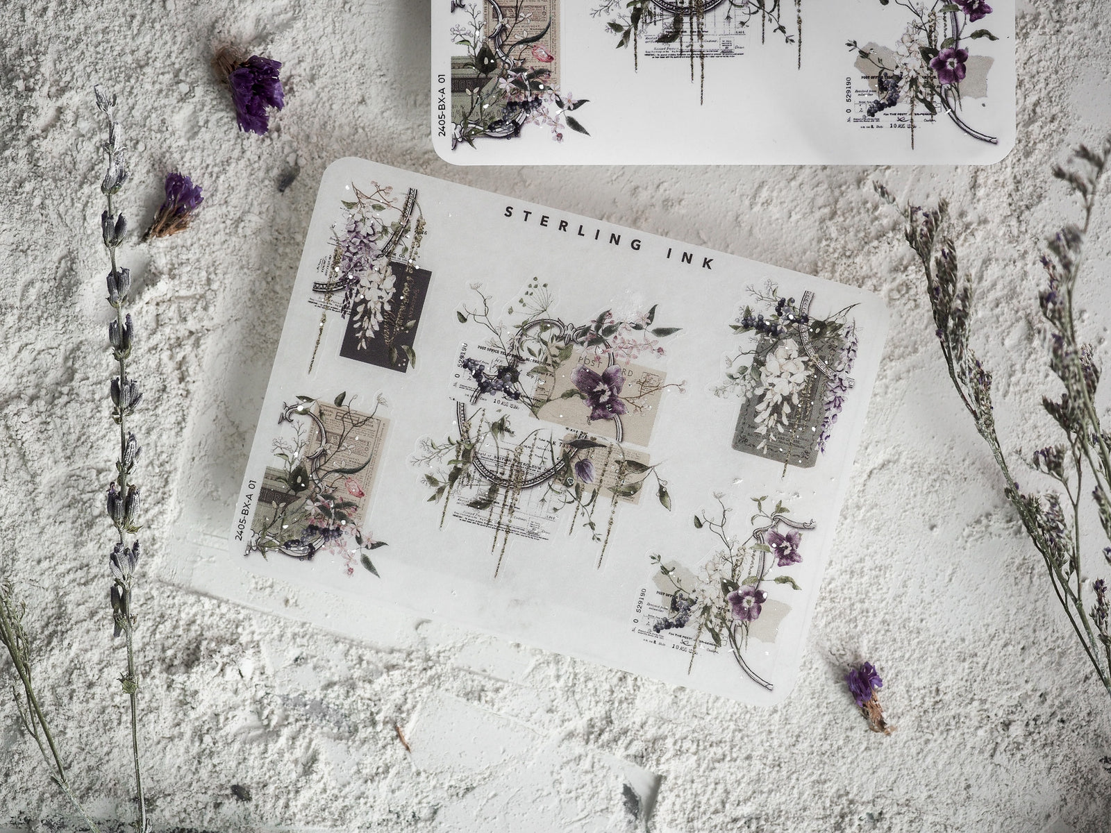 Decorative sheet of edges and corners stickers featuring an intricate botanical theme, combining silver foil accents with detailed purple florals and vintage sketches.