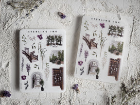 Watercolor sticker sheets featuring vintage botanical elements, detailed garden arches, and miniature architectural icon designs.