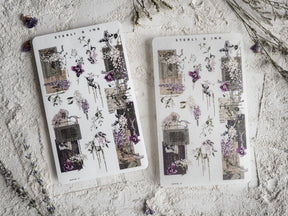 Vintage washi strip stickers featuring a decorative blend of architectural panels, muted sepia tones, and abundant purple floral and botanical arrangements.