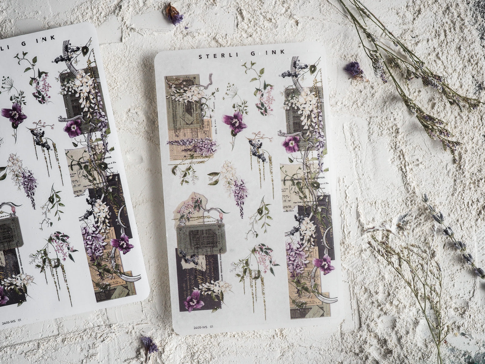 Intricate washi sticker sheets featuring elegant, vintage engravings of purple floral clusters mixed with antique text and architectural elements.