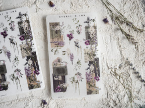 Intricate washi sticker sheets featuring elegant, vintage engravings of purple floral clusters mixed with antique text and architectural elements.
