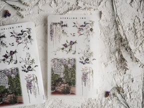 Watercolor arrangement stickers featuring delicate clusters of purple and pink flowers, lush vines, and elegant garden archways.