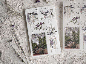 May 2024 sticker sheet featuring elegant botanical arrangements, delicate purple floral illustrations, and charming greenhouse scenes for journaling.